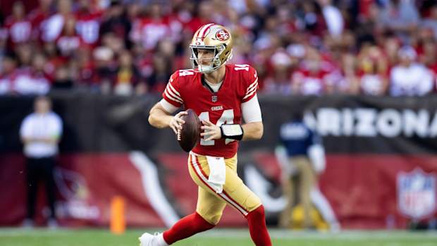 Dec 17, 2023; Glendale, Arizona, USA; San Francisco 49ers quarterback Sam Darnold (14) against the Arizona Cardinals at State Farm Stadium.